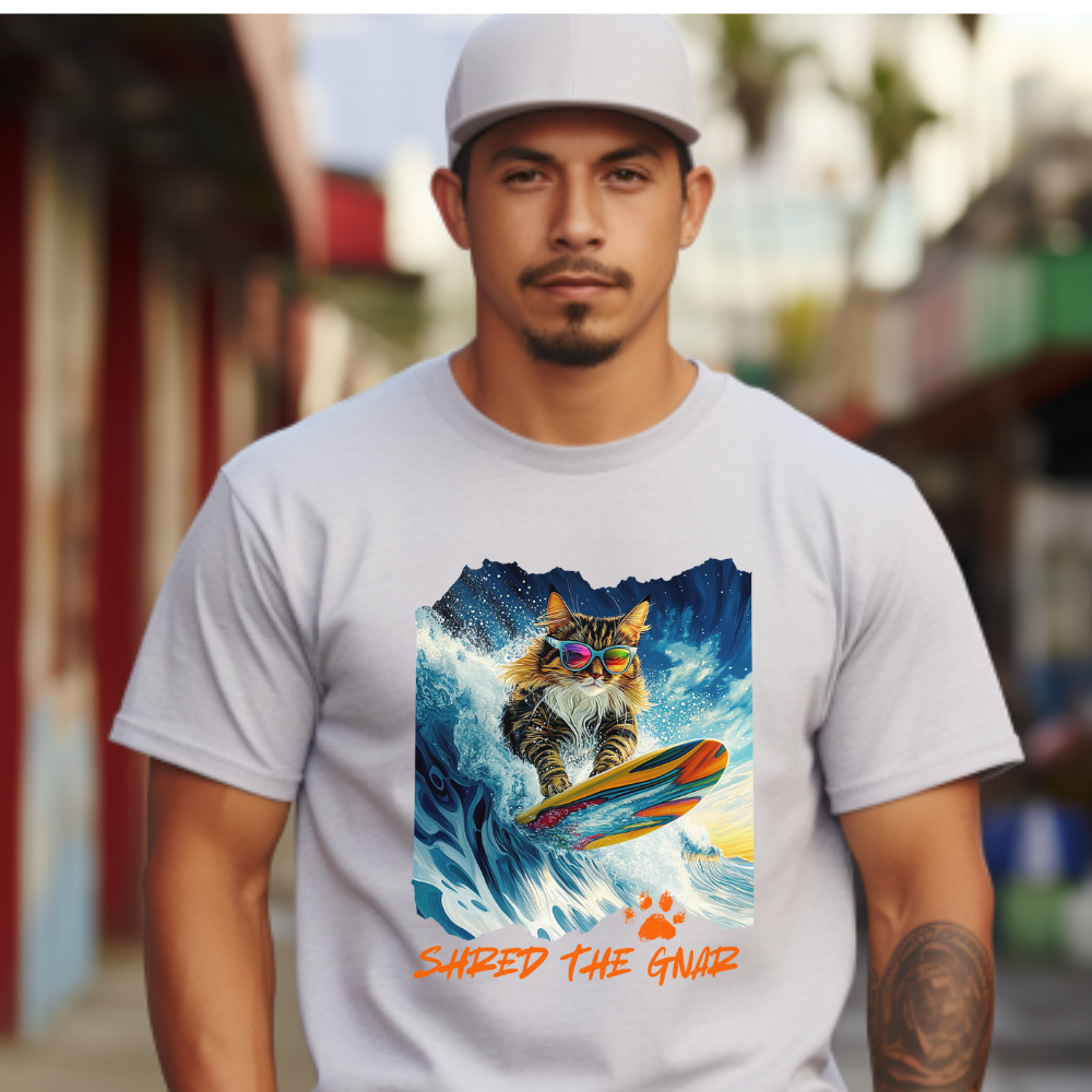 SHRED THE GNAR Surfer - Surfing Cat Graphic Tee, Cat on Surfboard reads "Live, Love Surf" Surf Life Cat ,Art Gift - Cool Cats Unisex Heavy Cotton Tee T-Shirt