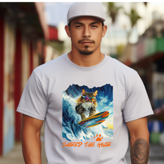 SHRED THE GNAR Surfer - Surfing Cat Graphic Tee, Cat on Surfboard  reads "Live, Love Surf"  Surf Life Cat ,Art Gift   -  Cool Cats Unisex Heavy Cotton Tee T-Shirt